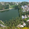 aerial_view_village_pond-olA3qumbKX