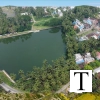 aerial_view_village_pond-olA3qumbKX