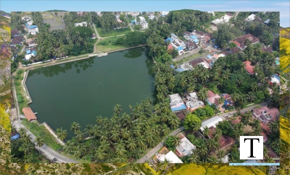 aerial_view_village_pond-olA3qumbKX